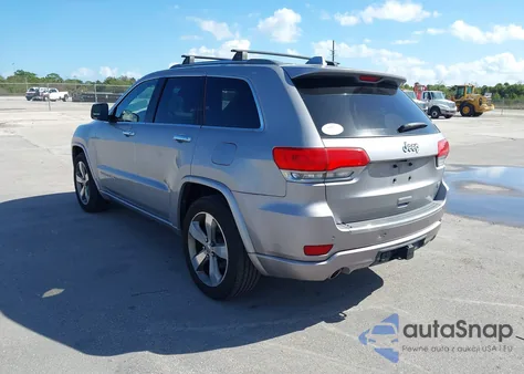 2014 Jeep Grand Cherokee Overland from USA, damaged, VIN 1C4RJECT8EC201562